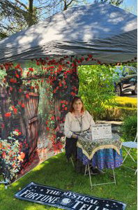 Festival style tent with summer fortune teller theme