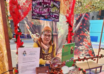 Festival booth with bright fortune teller theme