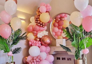 Balloon garland with helium balloon bunches