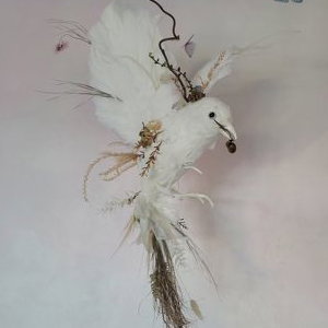 Handmade bird using dried flowers