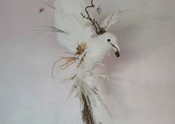 Handmade bird using dried flowers