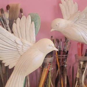 Hand carved birds for Annabells Private members club