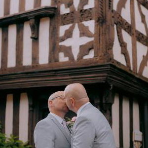 Two Grooms kissing