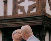 Two Grooms kissing