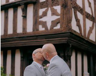 Two Grooms kissing