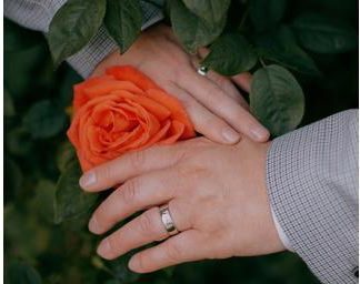 LGBTQ+ Wedding, Two Grooms showing rings