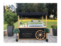 Victoria's Ice Cream Cart logo