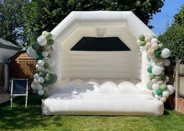 white bounchy castle 2 cheeky events