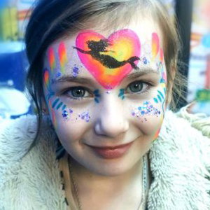 Bright colour Mermaid Face paint with glitter