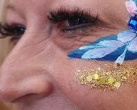 Adult facepaint with handmade bling
