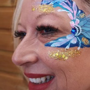 Adult facepaint with handmade bling