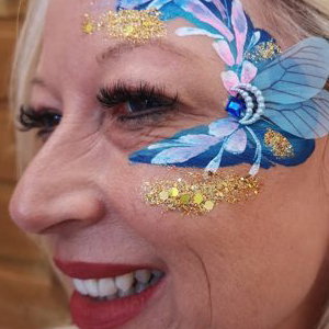 Adult facepaint with handmade bling