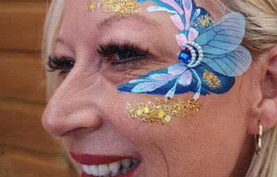 Adult facepaint with handmade bling
