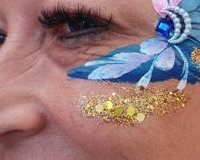 Adult facepaint with handmade bling