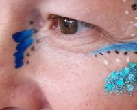 Adult facepaint with handmade bling