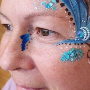 Adult facepaint with handmade bling
