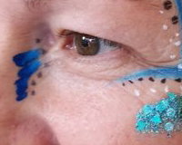 Adult facepaint with handmade bling