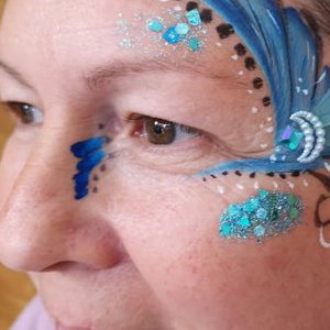 Adult facepaint with handmade bling