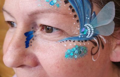 Adult facepaint with handmade bling