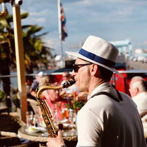 Saxophonist rooftop party