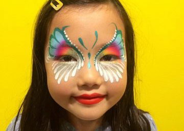 Rainbow butterfly face paint