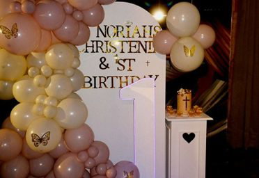 Elegant christening balloon decor