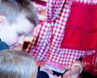 Amelie Appleby reads children's palms at Hamleys