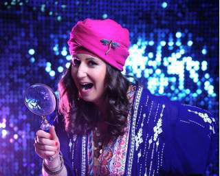 Fun Fortune Teller mingles through crowds with lighthearted insights, leaving guests laughing.