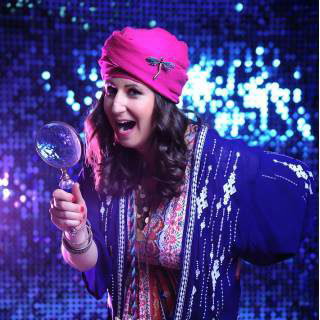 Fun Fortune Teller mingles through crowds with lighthearted insights, leaving guests laughing.